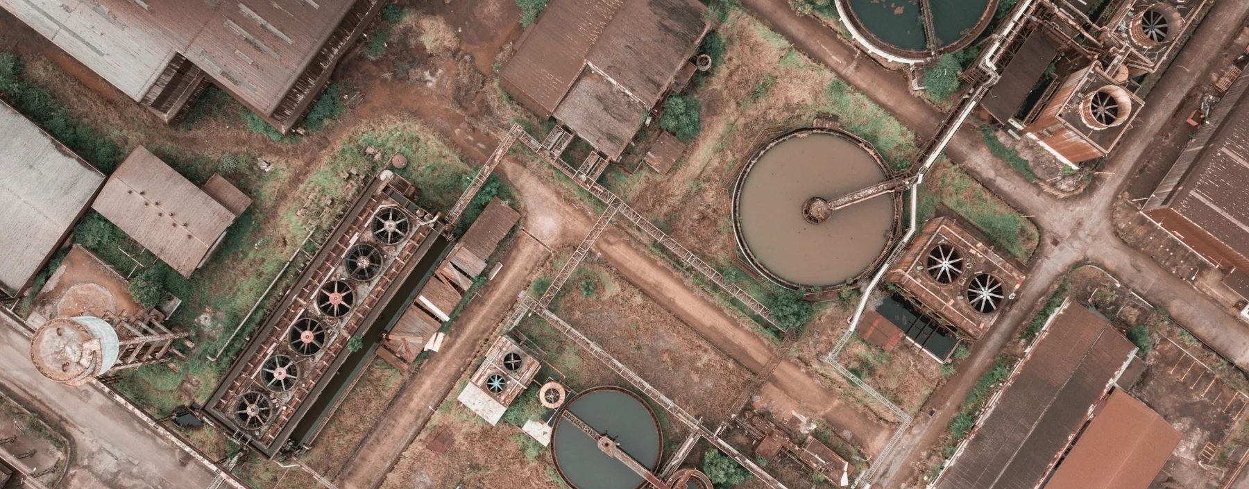 Aerial view of a water treatment and settlement pond installation.